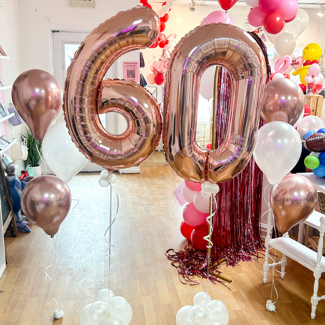 Helium balloon bouquets, jumbo number balloons, birthday balloons, party decorations, custom balloon delivery, festive balloon arrangements